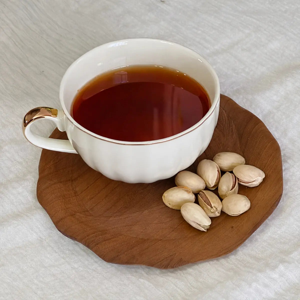 Hand-Carved Wooden Feather Coaster