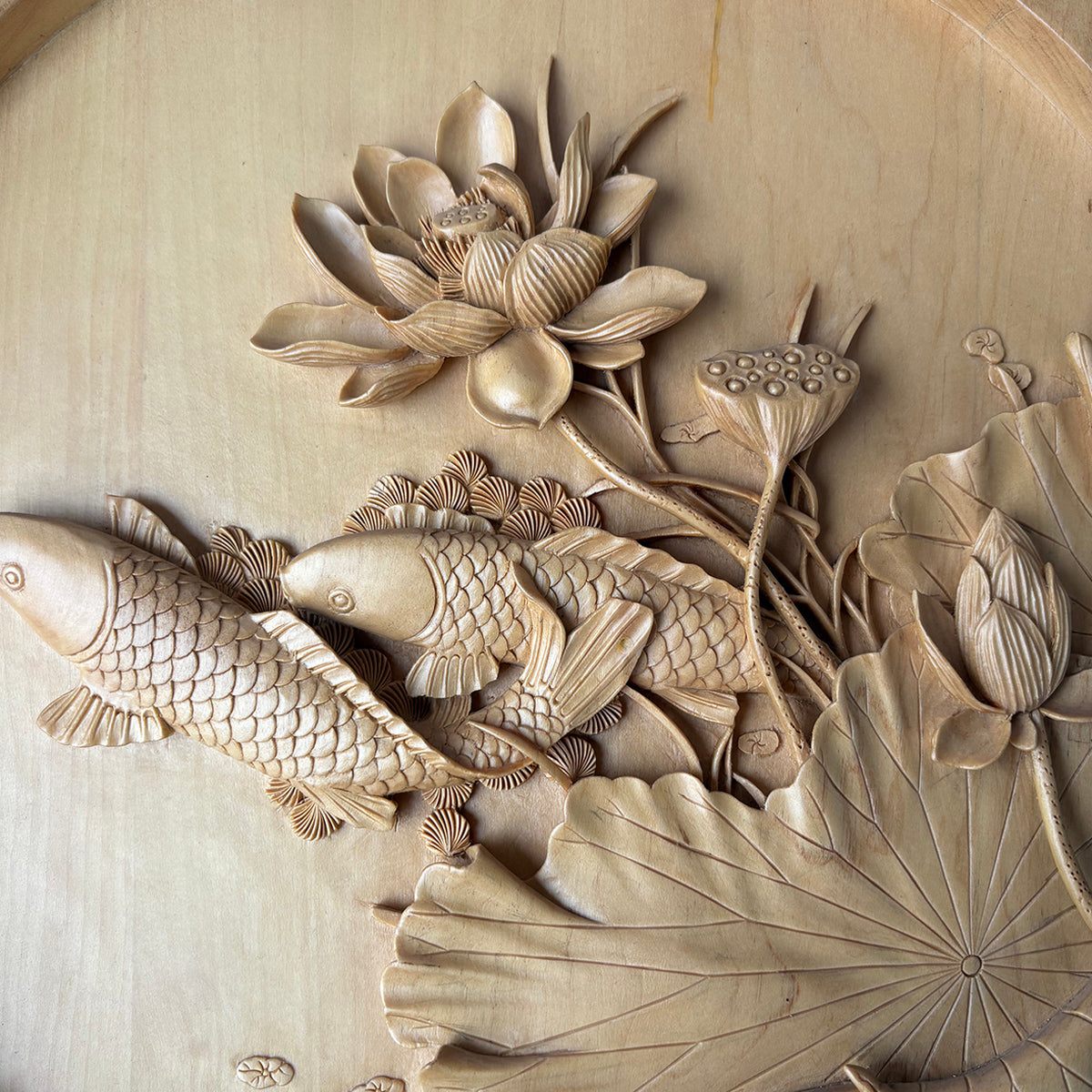 Hand-Carved Pictures of Fish and Lotus Flowers