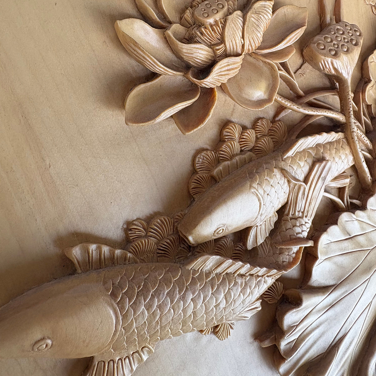 Hand-Carved Pictures of Fish and Lotus Flowers